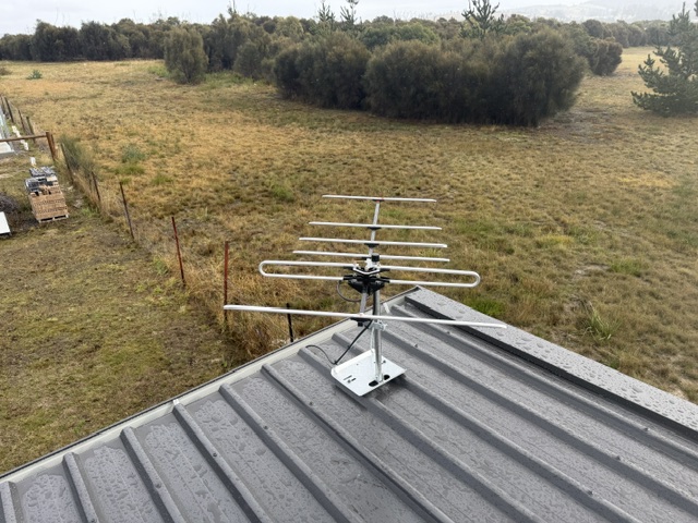 VHF TV antenna on a roof bracket overlooking paddocks in Acton Park, Tasmania