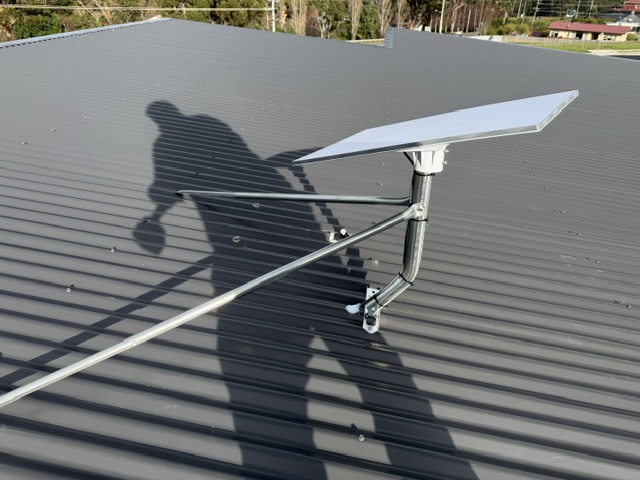 Starlink dish on a braced roof mount in Geeveston, Tasmania